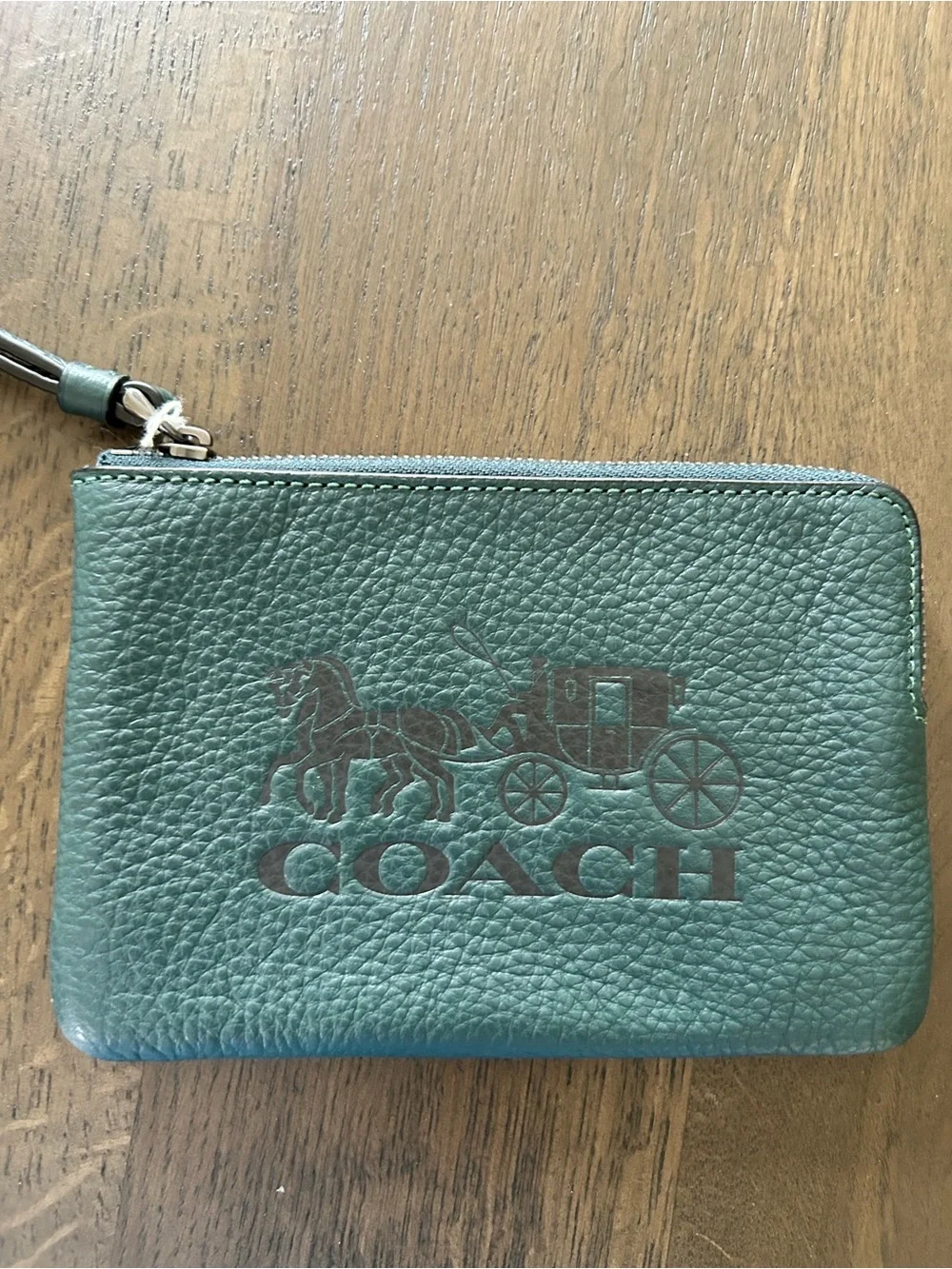 Coach carriage embossed green wristlet leather